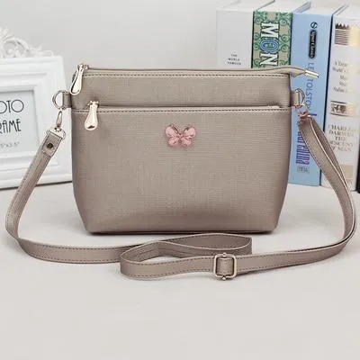 "Free shipping, 2018 new women handbags, fashion bowknot flap, trend Korean version shoulder bag, shell woman messenger bag."